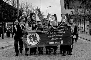 poster holders on Boot Out Austerity walk